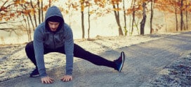 Male runner doing stretching exercise